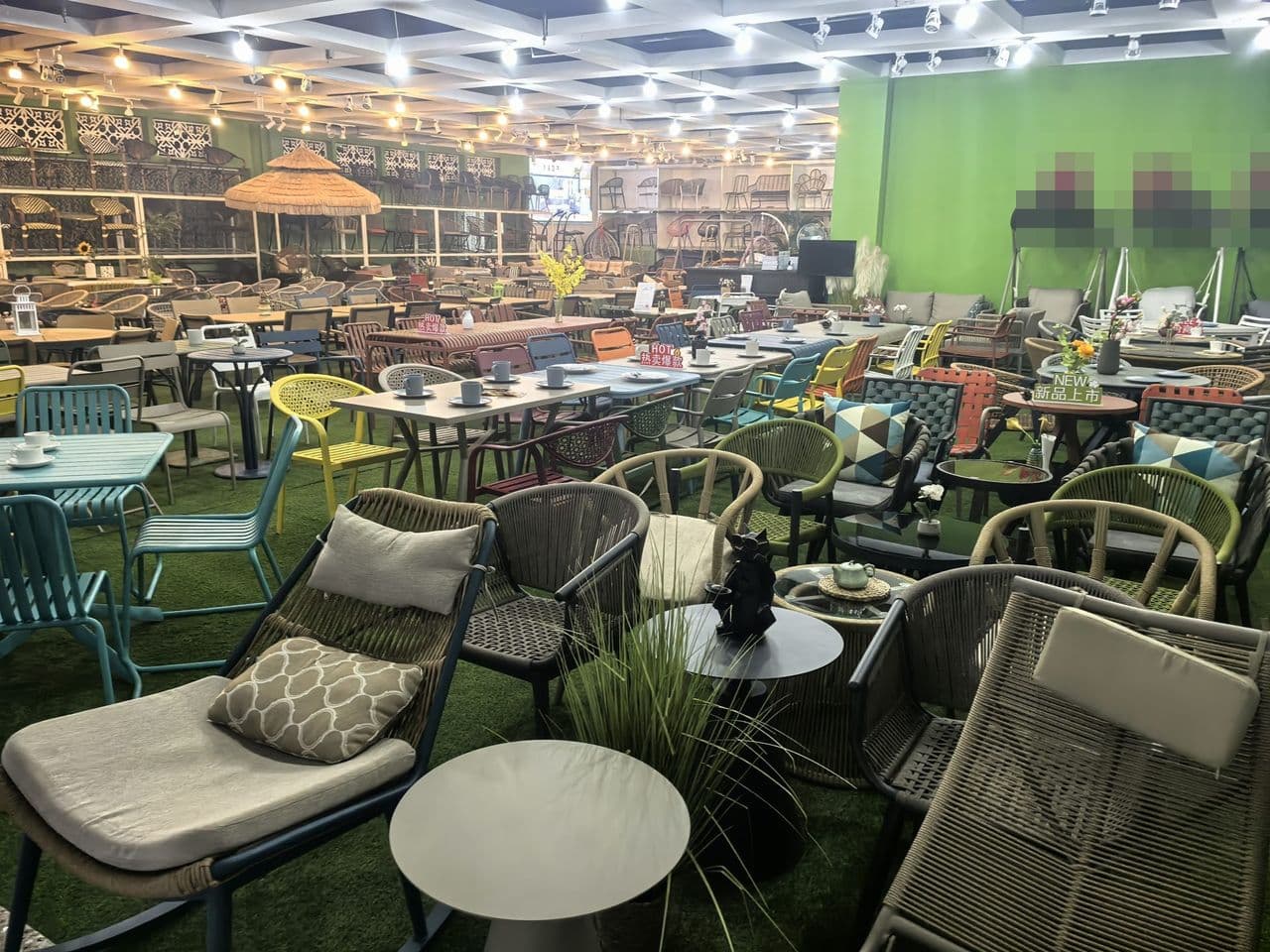 Outdoor furniture showroom displaying 200+ rattan SKUs