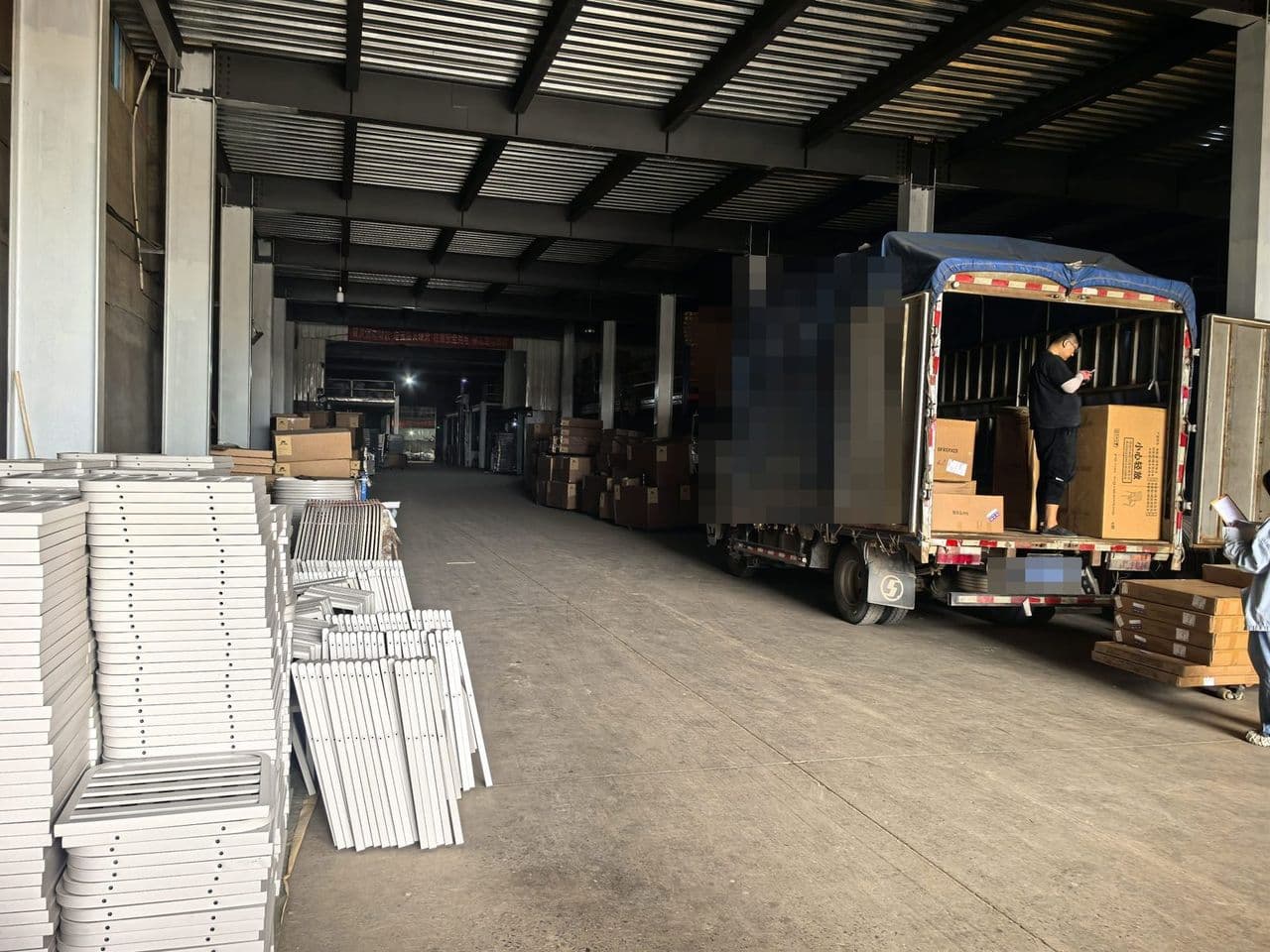 Truck being loaded at a furniture factory warehouse in Foshan, China