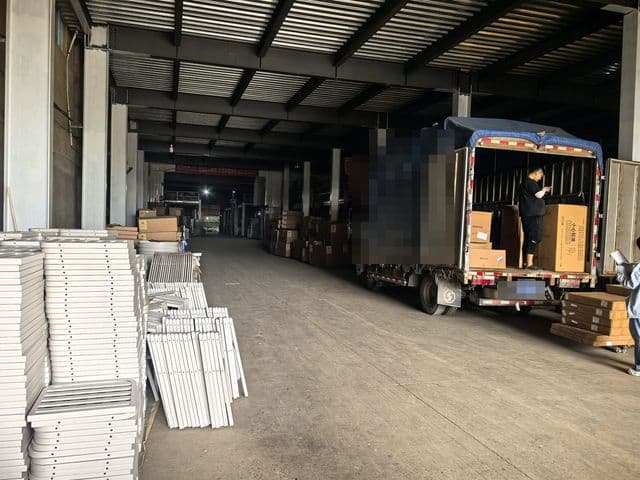 Truck being loaded at a furniture factory warehouse in Foshan, China